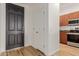Welcoming entryway with stylish door and access to kitchen at 11640 N Tatum Blvd # 2012, Phoenix, AZ 85028