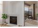 Inviting living room with fireplace and access to outdoor patio at 11640 N Tatum Blvd # 2012, Phoenix, AZ 85028