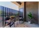 Cozy patio with comfortable seating, plants and a privacy screen at 11640 N Tatum Blvd # 2012, Phoenix, AZ 85028