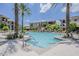 Resort-style pool surrounded by palm trees and comfortable lounge chairs at 11640 N Tatum Blvd # 2012, Phoenix, AZ 85028