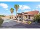 Home features a backyard with a pool, pergola, and well-maintained landscaping at 1192 E Sunset Dr, Casa Grande, AZ 85122
