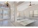 Bright and airy foyer with tile flooring, a decorative chandelier, and high ceilings at 1192 E Sunset Dr, Casa Grande, AZ 85122