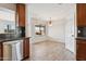 Bright and airy kitchen area featuring modern stainless steel appliances and ample cabinet space at 1192 E Sunset Dr, Casa Grande, AZ 85122