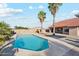 Home showcases a refreshing pool with ample space to enjoy the outdoors at 1192 E Sunset Dr, Casa Grande, AZ 85122