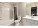Bathroom featuring a vanity, toilet, and tub with a shower, offering a clean and functional space at 125 N Sunvalley Blvd # 119, Mesa, AZ 85207