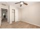 Bedroom featuring neutral walls, carpet, and a closet with sliding doors at 125 N Sunvalley Blvd # 119, Mesa, AZ 85207