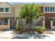 Charming townhouse with a cozy front yard and secure wrought iron fence at 125 N Sunvalley Blvd # 119, Mesa, AZ 85207