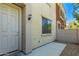 Inviting entryway featuring a neutral color palette and classic outdoor sconce at 125 N Sunvalley Blvd # 119, Mesa, AZ 85207