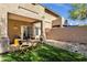 Cozy backyard with patio, dining set, and artificial turf at 12852 N Mountainside Dr # 2, Fountain Hills, AZ 85268