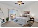 Airy main bedroom with a sliding glass door to balcony, neutral decor, and stylish accents at 12852 N Mountainside Dr # 2, Fountain Hills, AZ 85268