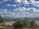 Expansive scenic view from the home overlooking mountains and desert landscape under cloudy skies at 12852 N Mountainside Dr # 2, Fountain Hills, AZ 85268