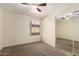 Simple bedroom with neutral carpet and mirrored closet, offering a functional and adaptable space at 1379 E Butler Cir, Chandler, AZ 85225