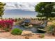 Landscaped entrance to the community with The Springs signage and a water feature at 1379 E Butler Cir, Chandler, AZ 85225