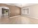 Dining area with a chandelier, shutters, and neutral-toned walls at 1379 E Butler Cir, Chandler, AZ 85225