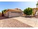 Inviting single-story home with a two-car garage and manicured landscaping, enhancing its visual appeal at 1379 E Butler Cir, Chandler, AZ 85225