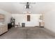 Spacious garage featuring storage cabinets and ample open space, perfect for vehicles and projects at 1379 E Butler Cir, Chandler, AZ 85225