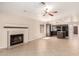 Large living room features fireplace, hard flooring, and connects to the kitchen at 1379 E Butler Cir, Chandler, AZ 85225