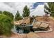 Beautiful waterfall feature in a community pond with lush landscaping at 1379 E Butler Cir, Chandler, AZ 85225