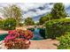 Beautiful community pond featuring a waterfall and lush landscaping at 1379 E Butler Cir, Chandler, AZ 85225