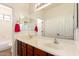 Bright bathroom with a double vanity, providing ample space at 15792 W Desert Mirage Dr, Surprise, AZ 85379