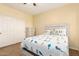 Inviting bedroom featuring light walls, closet, and natural light at 15792 W Desert Mirage Dr, Surprise, AZ 85379
