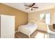 Comfortable bedroom with a bed, closet, and dresser, ideal for relaxation at 15792 W Desert Mirage Dr, Surprise, AZ 85379