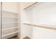 Well-organized closet featuring multiple shelves and rods for efficient storage at 15792 W Desert Mirage Dr, Surprise, AZ 85379