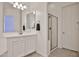 Bright bathroom featuring a single sink vanity and a glass-enclosed shower for a clean, modern aesthetic at 17082 S 182Nd Ave, Goodyear, AZ 85338