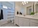 Bathroom with a modern vanity, toilet, and shower-tub combination at 17082 S 182Nd Ave, Goodyear, AZ 85338