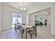 Inviting dining room with a view of the backyard and easy access to the gym at 17082 S 182Nd Ave, Goodyear, AZ 85338