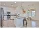Well-lit kitchen featuring stainless steel appliances, granite countertops, ample cabinet space, and adjacent breakfast nook at 17082 S 182Nd Ave, Goodyear, AZ 85338
