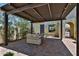 Charming outdoor patio with a covered pergola, stylish pavers, and a comfortable seating area for relaxing at 17082 S 182Nd Ave, Goodyear, AZ 85338