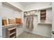 Spacious walk-in closet with ample shelving and hanging space at 17962 W Sand Hills Rd, Surprise, AZ 85387