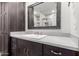 Bathroom vanity with a large mirror and custom cabinets at 1804 S Standage Cir, Mesa, AZ 85202