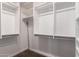 Walk-in closet offers ample storage with custom shelving and clothing rods at 1804 S Standage Cir, Mesa, AZ 85202