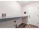 Laundry room featuring tile flooring and a countertop at 1804 S Standage Cir, Mesa, AZ 85202