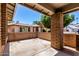 View of the patio with brick pillars, looking out onto neighboring houses at 1804 S Standage Cir, Mesa, AZ 85202