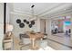 Chic dining room with modern lighting, stylish decor, and neutral color palette creating an inviting space for gatherings at 19910 W Mulberry Dr, Buckeye, AZ 85396