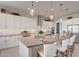 Spacious kitchen features a large island with countertop seating and ample cabinet space at 19910 W Mulberry Dr, Buckeye, AZ 85396
