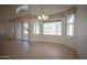 Sun-filled dining area features large windows and tiled floors, perfect for Gathering meals at 19961 N Coyote Lakes Pkwy, Surprise, AZ 85378