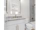 Bathroom featuring a granite-look countertop, white vanity, and brushed gold hardware at 20115 E Sonoqui E Blvd, Queen Creek, AZ 85142