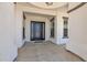 Elegant front door featuring decorative glass, sidelights, and stylish accents at 20115 E Sonoqui E Blvd, Queen Creek, AZ 85142