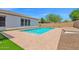 Refreshing swimming pool with fountain features and surrounding brick patio at 20115 E Sonoqui E Blvd, Queen Creek, AZ 85142