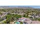 An aerial view of the home nestled in a vibrant community with mountain views at 20437 W White Rock Rd, Buckeye, AZ 85396