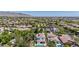 An aerial view of the home nestled in a vibrant community with mountain views at 20437 W White Rock Rd, Buckeye, AZ 85396