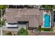 Aerial shot of home's roof, showcasing tile detail, layout, and the backyard pool area, providing a comprehensive view at 20437 W White Rock Rd, Buckeye, AZ 85396