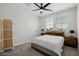 Cozy bedroom with a comfortable bed, ambient lighting, and serene decor for a peaceful retreat at 20437 W White Rock Rd, Buckeye, AZ 85396