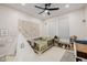 Inviting bedroom with a cozy teepee, a world map and whimsical decor creating a fun, playful space at 20437 W White Rock Rd, Buckeye, AZ 85396