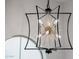 Arched window and modern chandelier add to a bright and airy space at 20437 W White Rock Rd, Buckeye, AZ 85396