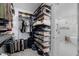Spacious walk-in closet that is neatly organized with shelving and storage units at 20437 W White Rock Rd, Buckeye, AZ 85396